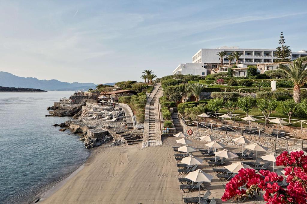 minos-palace-hotel-suites-adults-only-private-pool-hotels-greece-7 Minos Palace Hotel & Suites - Adults Only beach